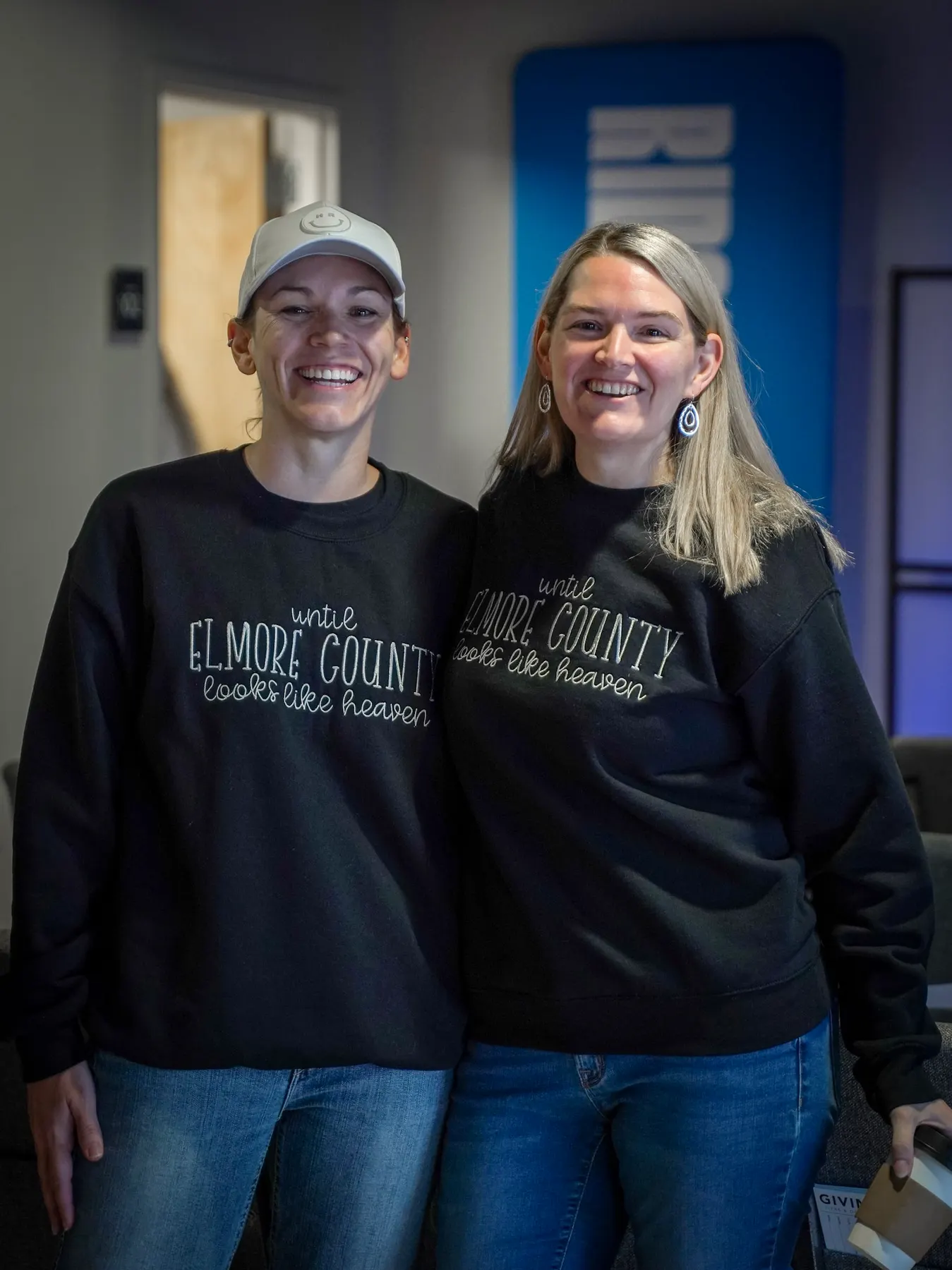 Two women in Elmore County sweatshirts