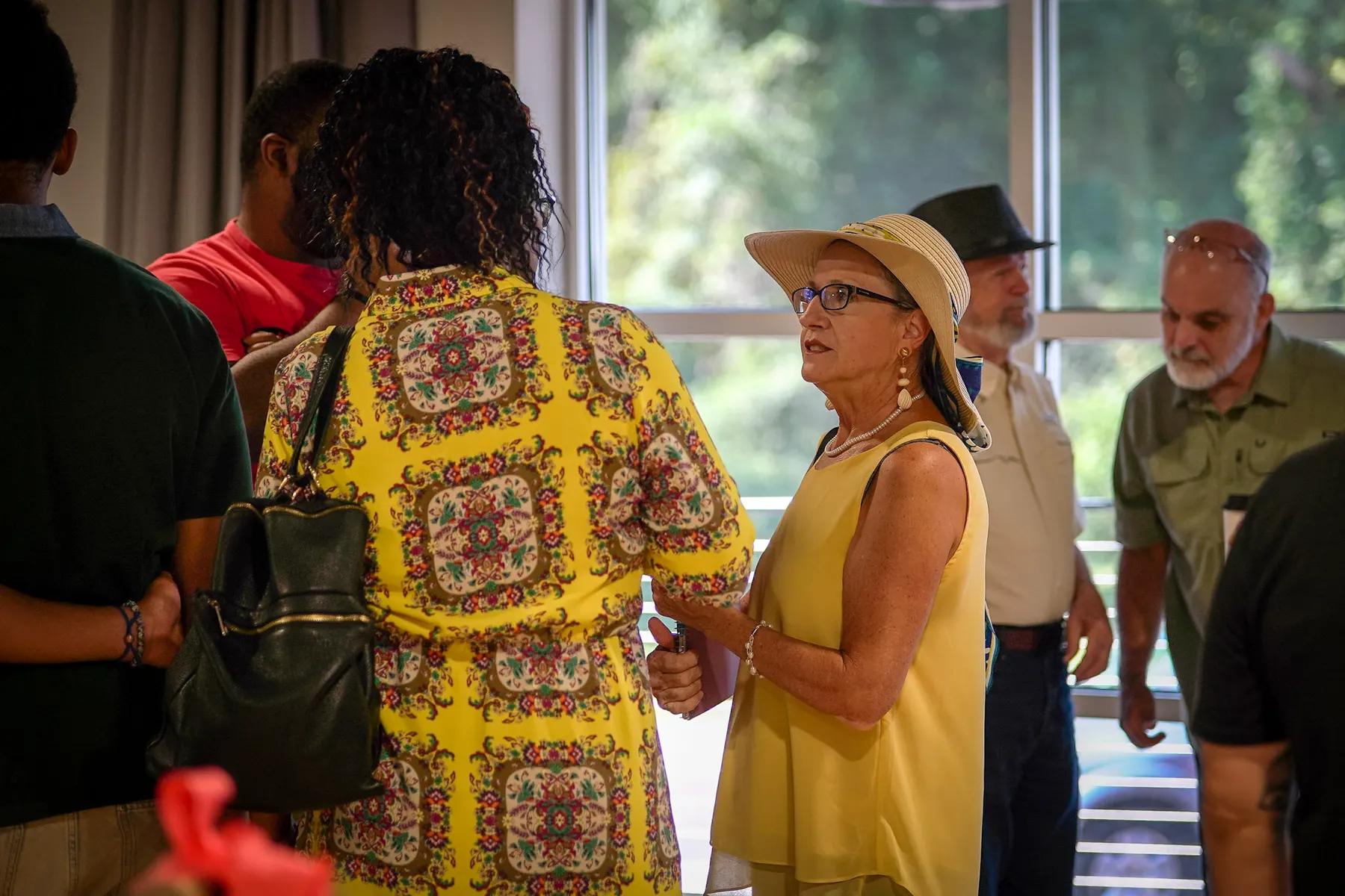 Two women talking before the service