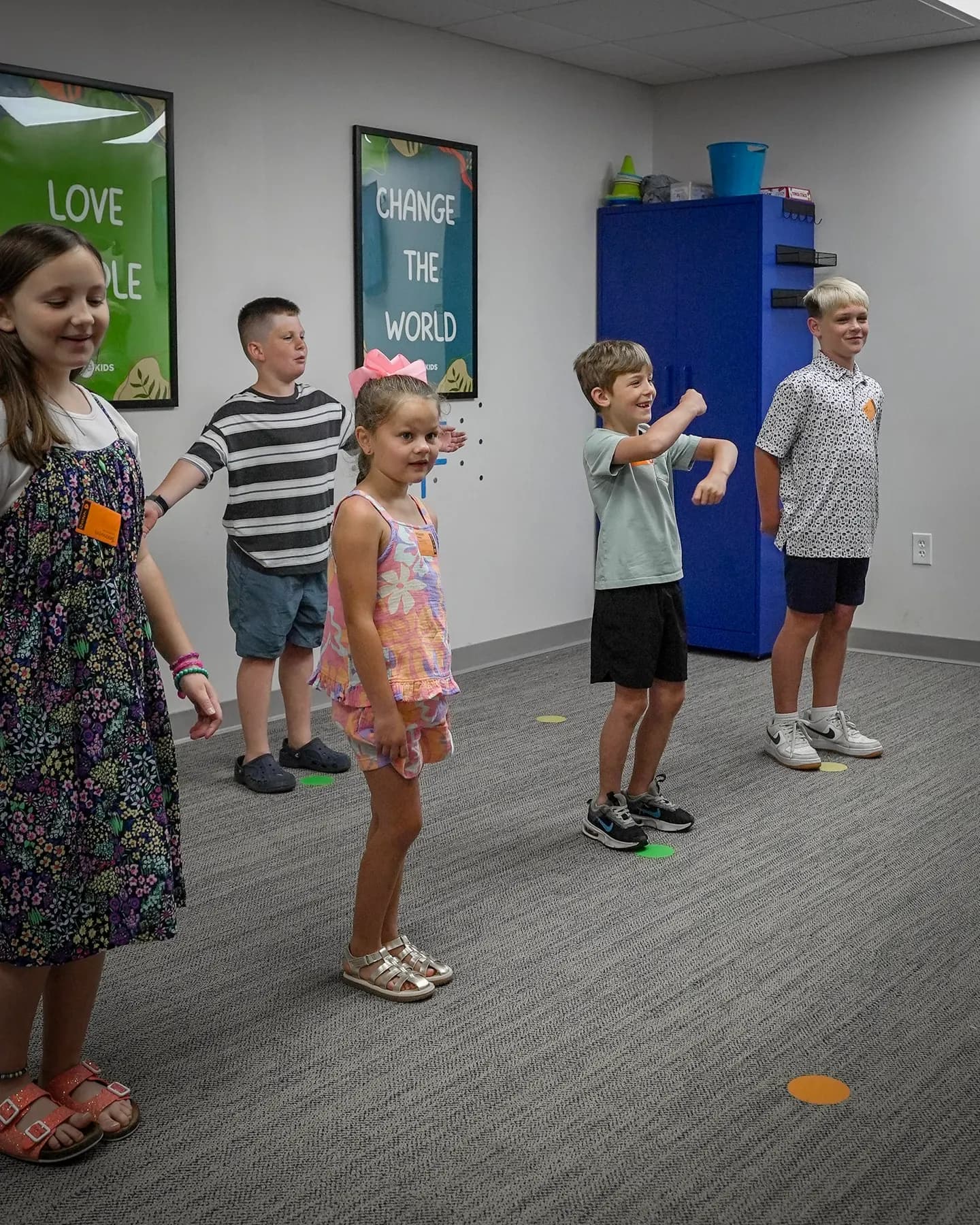 Children singing together in the RWC Kids room